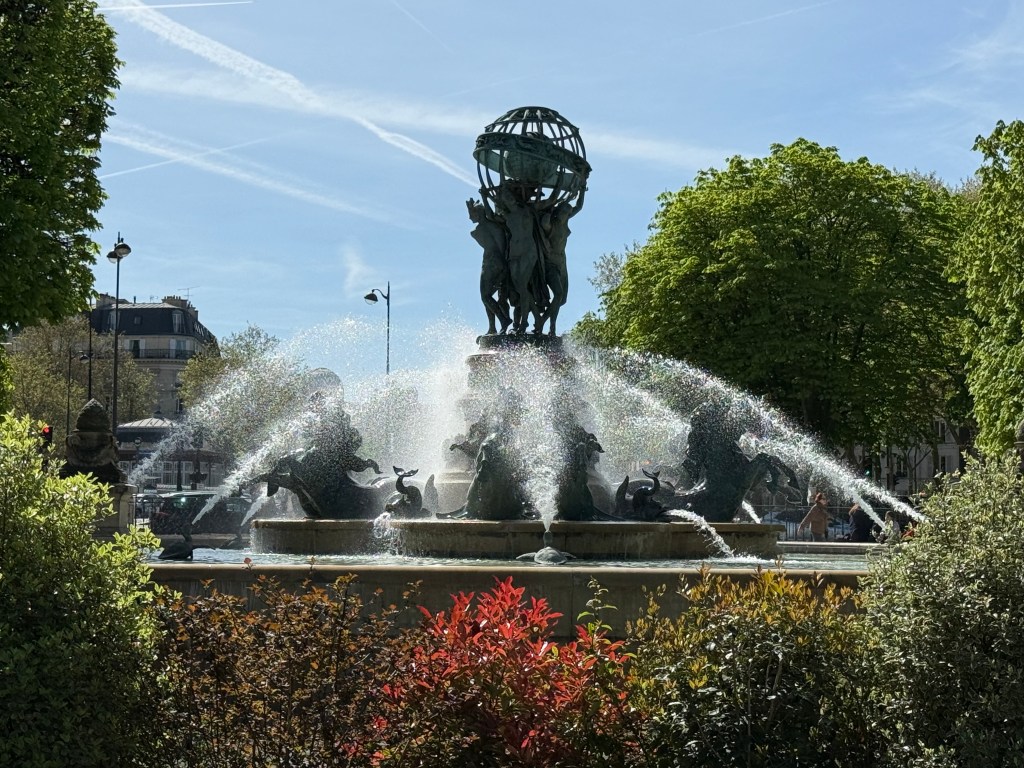 side view of the fountain with the water shooting upwards towards the centre