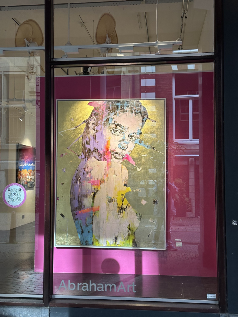 
The window of an art gallery in Amsterdam. I took the picture because I liked the artwork. 