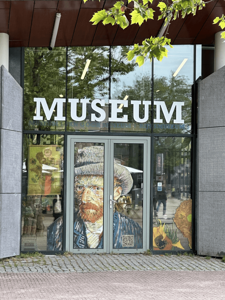 Entrance of the van Gogh Museum shop in Amsterdam. I like how van Gogh's self portrait is displayed on the door. 