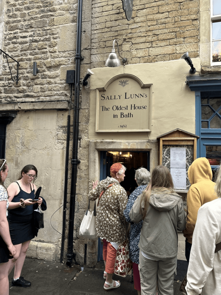 People queueing in Bath to go into Sally Lunn's bakery